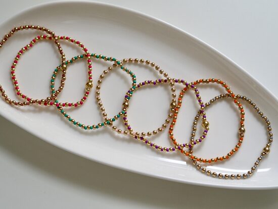 Perlenarmband bunt / gold